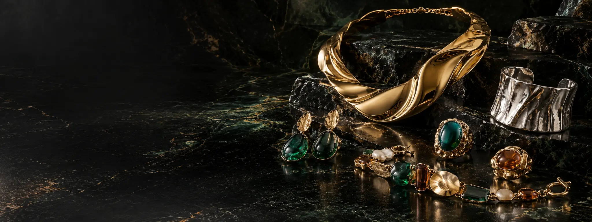 Premium Italian gold, silver and costume jewelry on dark stone